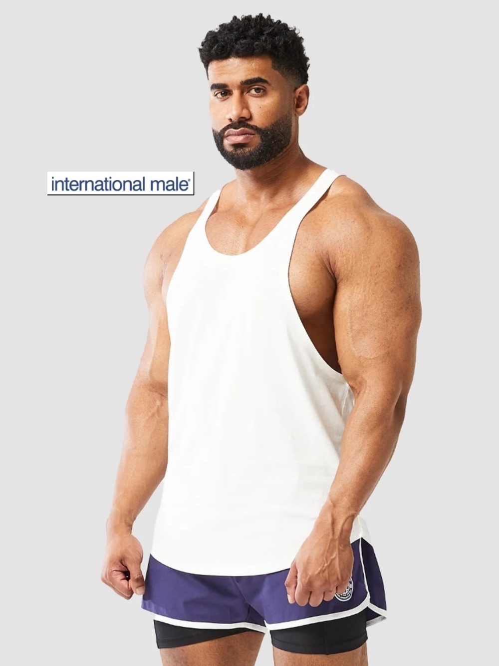 International Male Stringer Tank Top XL Gently worn 100% cotton 21" armpits
